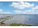 This wide aerial view highlights the intercoastal, bridge, and community's access to waterfront activities at 2700 Bayshore Blvd # 9404, Dunedin, FL 34698