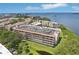 Beautiful aerial view of a condominium complex by the water, offering serene waterfront living at 2700 Bayshore Blvd # 9404, Dunedin, FL 34698