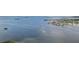 Gorgeous aerial view of waterways, islands, and the coast with boats leaving wakes in the water at 2700 Bayshore Blvd # 9404, Dunedin, FL 34698