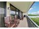 Relax on this inviting balcony with comfortable seating and picturesque river views, perfect for unwinding after a long day at 2700 Bayshore Blvd # 9404, Dunedin, FL 34698