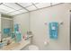 Bright bathroom with white tile and walk-in shower at 2700 Bayshore Blvd # 9404, Dunedin, FL 34698