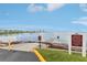 Community beach access with sign reading Private Property Beach & Park, no pets, residents only at 2700 Bayshore Blvd # 9404, Dunedin, FL 34698