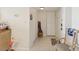 Inviting entryway with tile flooring, storage options, and a seating area at 2700 Bayshore Blvd # 9404, Dunedin, FL 34698