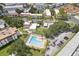 Aerial view of the community pool, highlighting the amenities available to residents on a sunny day at 2700 Bayshore Blvd # 9404, Dunedin, FL 34698