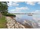 Scenic view of the bay with rocks along the shoreline and a boat anchored on the water at 2700 Bayshore Blvd # 9404, Dunedin, FL 34698