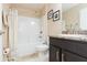 Bathroom featuring a shower with a white curtain, vanity with drawers, and toilet at 27941 Austin Woods Dr, Dade City, FL 33525