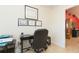 This office space is bright and features a sleek black desk and comfortable black office chair at 27941 Austin Woods Dr, Dade City, FL 33525