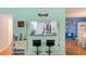 Charming bar area with stools and tiki decor, perfect for entertaining at 300 Promenade Dr # 106, Dunedin, FL 34698