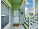Inviting front entrance with steps leading to the door and a charming welcome mat at 300 Promenade Dr # 106, Dunedin, FL 34698