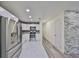 Well-appointed kitchen featuring stainless steel appliances, white cabinetry, and a modern backsplash at 3218 N 16Th St, Tampa, FL 33605
