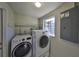 This is a laundry room with new appliances at 3218 N 16Th St, Tampa, FL 33605