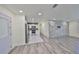 Inviting living space connecting to a contemporary kitchen and a decorative stone wall at 3218 N 16Th St, Tampa, FL 33605