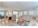 Comfortable living room adjacent to the dining area at 35246 Tiffani Ct, Zephyrhills, FL 33541