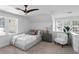 A stylish bedroom features a neutral color palette and cozy furniture at 3801 Bayshore Blvd, Tampa, FL 33611