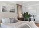 Spacious bedroom featuring neutral decor, a large bed, bedside tables, and stylish curtains at 3801 Bayshore Blvd, Tampa, FL 33611