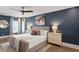 Cozy bedroom featuring a navy blue color scheme and decorative bedside lamps at 3801 Bayshore Blvd, Tampa, FL 33611
