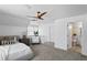 Bright bedroom with wood fan and an ensuite bathroom at 3801 Bayshore Blvd, Tampa, FL 33611