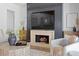 Cozy living room with fireplace and built-in entertainment center at 3801 Bayshore Blvd, Tampa, FL 33611