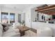 Open-concept living area with a modern design and access to the balcony at 3801 Bayshore Blvd, Tampa, FL 33611