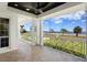 Inviting patio with views featuring decorative railings and a ceiling fan for outdoor enjoyment at 3801 Bayshore Blvd, Tampa, FL 33611