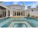 Beautiful pool and spa, surrounded by luxurious landscaping and serene outdoor living space at 3801 Bayshore Blvd, Tampa, FL 33611