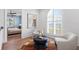 Cozy sitting area with light walls, modern decor, and a large arched window providing abundant light at 3801 Bayshore Blvd, Tampa, FL 33611