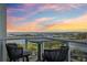 Balcony with seating and scenic water views, perfect for relaxation and enjoying sunsets at 400 Beach Ne Dr # 1202, St Petersburg, FL 33701