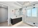 Stylish bathroom showcasing a glass walk-in shower, single vanity, and modern fixtures at 400 Beach Ne Dr # 1202, St Petersburg, FL 33701