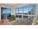 Bedroom with large windows offering city and ocean views, bright and airy at 400 Beach Ne Dr # 1202, St Petersburg, FL 33701