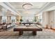 Bright billiards room with ample seating for guests at 400 Beach Ne Dr # 1202, St Petersburg, FL 33701