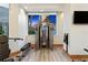 Well-equipped fitness center with modern exercise machines and a view of the city at 400 Beach Ne Dr # 1202, St Petersburg, FL 33701
