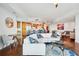 Open concept living room, hardwood floors, adjoins a dining area and kitchen at 400 Beach Ne Dr # 1202, St Petersburg, FL 33701