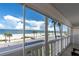 Balcony with beach view and white railings at 403 Gulf Way # 302, St Pete Beach, FL 33706