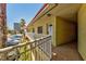 Condo exterior view, showcasing well-maintained building facade, walkway, and parking at 4103 Gulf Blvd # 205, St Pete Beach, FL 33706