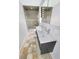 Modern bathroom featuring a double sink vanity, large mirror, and glass-enclosed shower at 4301 50Th S Ter, St Petersburg, FL 33711