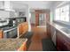 Bright kitchen with granite counters, stainless steel appliances and wooden cabinetry at 4301 50Th S Ter, St Petersburg, FL 33711