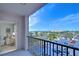Enjoy the outdoor balcony with railings, showcasing scenic views of the city and the surrounding landscape at 5220 Brittany S Dr # 807, St Petersburg, FL 33715