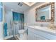 Relaxing bathroom with a vanity, framed mirror, and a shower-tub combination at 5220 Brittany S Dr # 807, St Petersburg, FL 33715