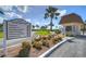 Welcome to Point Brittany sign amidst lush landscaping and a guard house at 5220 Brittany S Dr # 807, St Petersburg, FL 33715