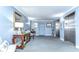 Inviting foyer with stylish decor, carpeted floors, comfortable seating, and convenient elevator access at 5220 Brittany S Dr # 807, St Petersburg, FL 33715