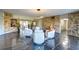 Stylish lounge area with modern chairs, unique brick walls, and slate flooring at 5220 Brittany S Dr # 807, St Petersburg, FL 33715