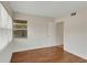 Cozy bedroom with bright natural light and gleaming hardwood floors at 5813 18Th S Ave, Gulfport, FL 33707