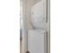 Convenient laundry area with a stacked washer and dryer unit at 5813 18Th S Ave, Gulfport, FL 33707