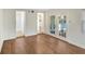 Living room featuring wood floors and glass doors at 5813 18Th S Ave, Gulfport, FL 33707
