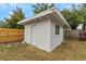 Exterior view of a cute outbuilding against a beautiful blue sky at 5813 18Th S Ave, Gulfport, FL 33707