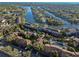 Aerial view of the community featuring waterfront homes, canals and beautiful landscaping at 6330 Newtown Cir # 30B4, Tampa, FL 33615