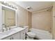 Bathroom featuring a vanity with dual sinks and a shower-tub combo at 6330 Newtown Cir # 30B4, Tampa, FL 33615