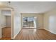 Living room featuring a sliding door leading to the balcony at 6330 Newtown Cir # 30B4, Tampa, FL 33615
