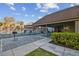 Pool area featuring seating, a grill, and a fenced pool at 6330 Newtown Cir # 30B4, Tampa, FL 33615