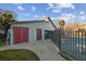 Pool area featuring fencing, bench, and nearby building at 6330 Newtown Cir # 30B4, Tampa, FL 33615